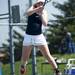 Saline High School #1 singles player Mary Hannah leaves the ground while hitting the ball on Saturday, April 27. Daniel Brenner I AnnArbor.com